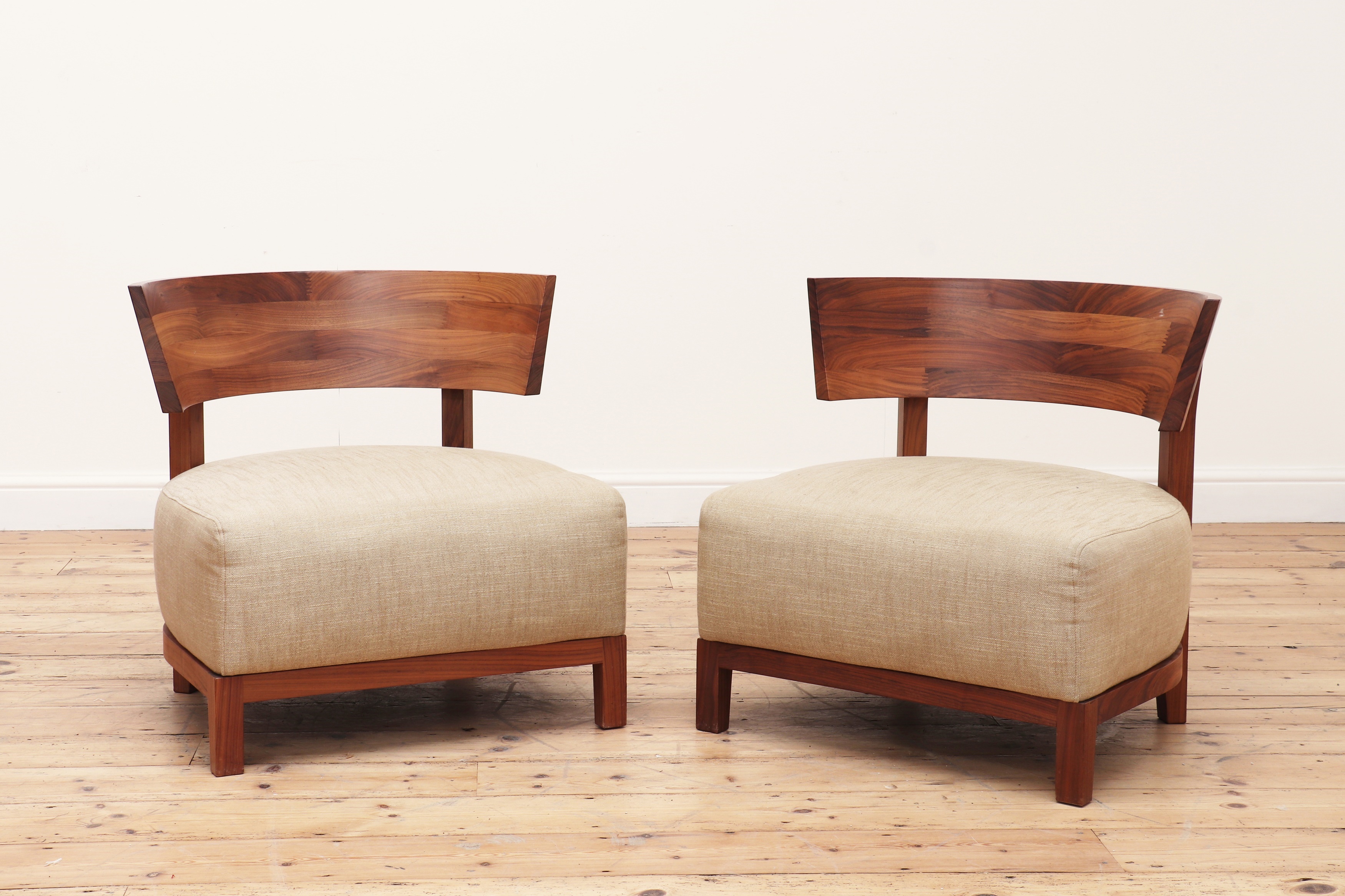 A pair of low tub chairs by Flexform